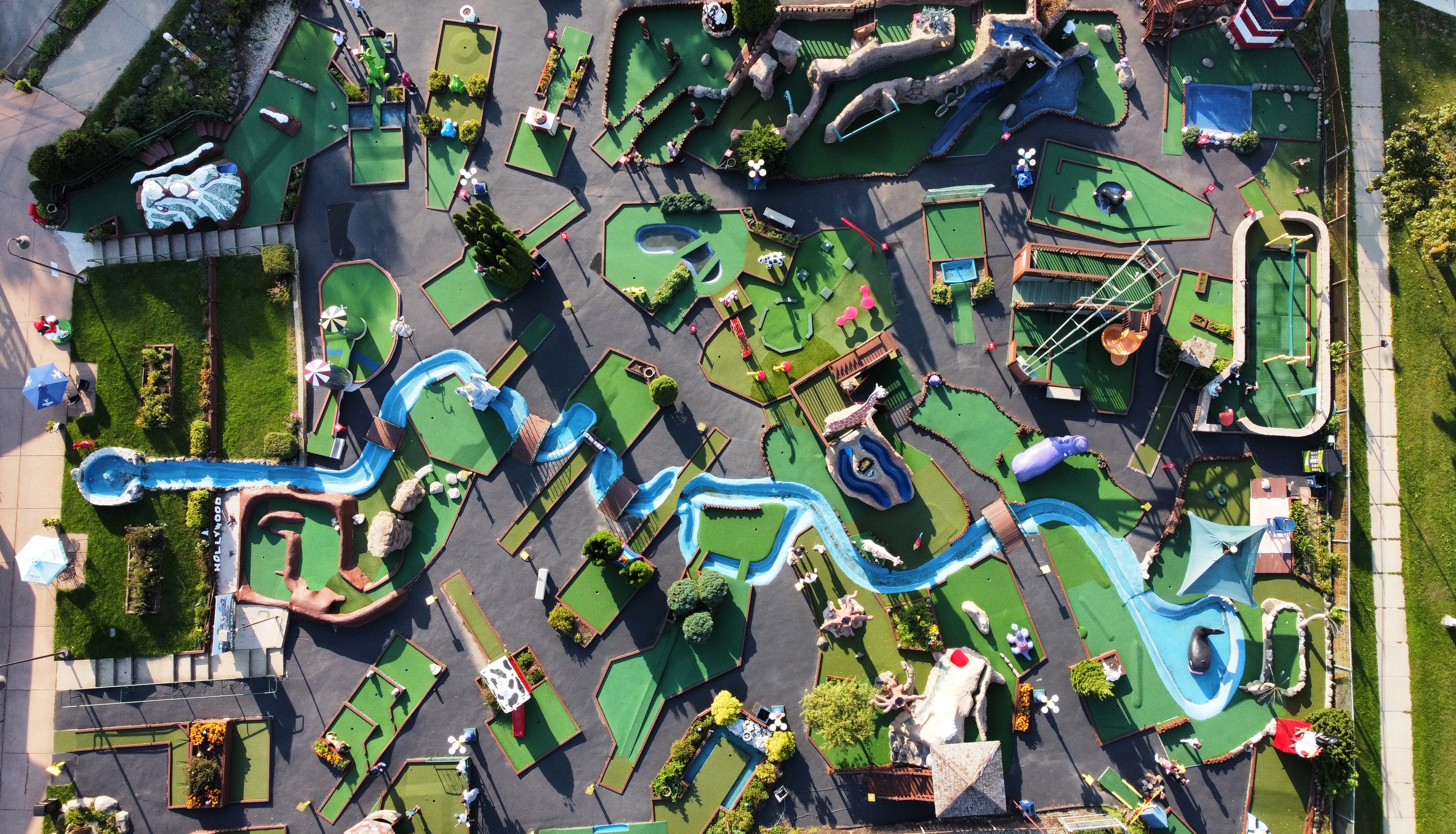 Image of golf ball on tee on grass.